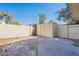 Enclosed backyard with hardscape, block fencing, and shed for extra storage space at 1061 E Fremont Dr, Tempe, AZ 85282