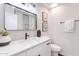 Clean bathroom featuring modern fixtures, a white vanity, and a stylish mirror for a fresh, updated look at 1061 E Fremont Dr, Tempe, AZ 85282