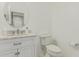 Bathroom featuring a marble vanity and modern fixtures at 10827 W Bronco Trl, Peoria, AZ 85383