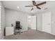 Bedroom featuring ceiling fan and doors at 10827 W Bronco Trl, Peoria, AZ 85383