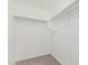 Walk-in closet with shelving and carpet at 10827 W Bronco Trl, Peoria, AZ 85383