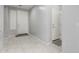 Bright foyer featuring clean tile flooring and neutral paint at 10827 W Bronco Trl, Peoria, AZ 85383