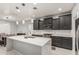 Gourmet kitchen featuring stainless appliances and marble countertops at 10827 W Bronco Trl, Peoria, AZ 85383