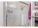 Tiled shower with glass doors at 10951 N 91St Ave # 84, Peoria, AZ 85345