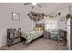 Bedroom with fun decor, natural lighting, and ceiling fan at 10951 N 91St Ave # 84, Peoria, AZ 85345