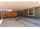 Spacious covered carport with a privacy fence and access to the home at 10951 N 91St Ave # 84, Peoria, AZ 85345