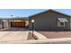 Charming home featuring a covered carport and low-maintenance landscaping at 10951 N 91St Ave # 84, Peoria, AZ 85345