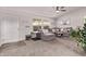Cozy living room with stylish decor, plush seating, and a ceiling fan at 10951 N 91St Ave # 84, Peoria, AZ 85345