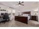 Main bedroom with hardwood furniture, carpet flooring and plenty of natural light at 10951 N 91St Ave # 84, Peoria, AZ 85345