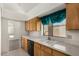 Cozy kitchen with plenty of counter space and a view to the yard at 11238 N 11Th St, Phoenix, AZ 85020