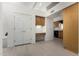 Open-concept space that combines the kitchen, living area, and office nook at 11238 N 11Th St, Phoenix, AZ 85020