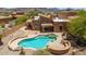 Aerial view of the backyard with a pool, spa, and desert landscaping at 11238 N 11Th St, Phoenix, AZ 85020