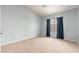Bedroom with blue walls, a vaulted ceiling, and dark blue curtains at 12120 E Cortez Dr, Scottsdale, AZ 85259