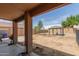 View of backyard featuring a gazebo, block wall, and covered patio area perfect for outdoor living at 12228 N 122Nd Dr, El Mirage, AZ 85335