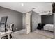 Bonus room featuring desk area and doorway to bedroom at 12228 N 122Nd Dr, El Mirage, AZ 85335