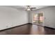 Bedroom features a ceiling fan and sliding glass doors to the backyard at 12459 N 36Th St, Phoenix, AZ 85032
