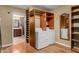 Laundry room provides laundry appliances, storage, and a glimpse into a nearby bath at 12459 N 36Th St, Phoenix, AZ 85032