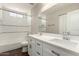 Bathroom with a large vanity, dual sinks, and a tub/shower combo at 1502 E Minton Dr, Tempe, AZ 85282