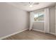 Bedroom with hardwood flooring, ceiling fan and a bright window at 1502 E Minton Dr, Tempe, AZ 85282