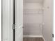 Walk-in closet with open door, wire shelving, and neutral paint; perfect for easy organization at 1502 E Minton Dr, Tempe, AZ 85282