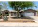 Charming single-story home with mature tree and attached two car garage at 1502 E Minton Dr, Tempe, AZ 85282