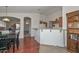 Inviting dining area with hardwood floors and open access to the kitchen and living areas at 1527 S 219Th Ln, Buckeye, AZ 85326