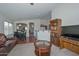 Inviting living room with open floor plan, seamlessly connecting the kitchen, dining, and lounge areas at 1527 S 219Th Ln, Buckeye, AZ 85326