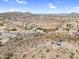 Panoramic aerial view showcasing the desert landscape, community, and serene location at 1550 W Adobe Dam Dr, San Tan Valley, AZ 85144