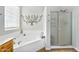 Primary bathroom featuring a soaking tub and a walk-in shower at 1550 W Adobe Dam Dr, San Tan Valley, AZ 85144
