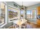 Bright dining area with large windows offering picturesque desert views at 1550 W Adobe Dam Dr, San Tan Valley, AZ 85144