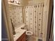The bathroom offers a single sink, mirror, and a shower and tub combo at 1643 E Oakland St, Chandler, AZ 85225