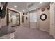 Unique bedroom design with oversized mirror, modern fan, and decor at 18835 W San Miguel Ave, Litchfield Park, AZ 85340