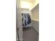 Functional closet with ample storage space for an organized wardrobe at 18835 W San Miguel Ave, Litchfield Park, AZ 85340