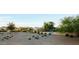 Beautiful view of the community's landscaped backyard and desert landscape, offering a peaceful and serene atmosphere at 18835 W San Miguel Ave, Litchfield Park, AZ 85340