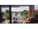Beautiful lake view from the patio featuring serene water and lush landscaping at 2004 N 108Th Dr, Avondale, AZ 85392