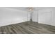 Spacious bedroom featuring light gray flooring, ceiling fan and neutral colors, ready for personalization at 211 N 7Th St, Avondale, AZ 85323