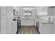 Bright kitchen showcasing modern appliances, granite countertops, and ample cabinet space at 211 N 7Th St, Avondale, AZ 85323