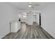 Open floor plan with view into the bright and modern kitchen with stainless steel appliances at 211 N 7Th St, Avondale, AZ 85323