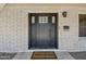 Stylish front door with decorative windows and a 'Home Sweet Home' doormat at 2519 E Geneva Dr, Tempe, AZ 85282