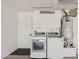 Bright laundry room with modern washer and dryer at 2519 E Geneva Dr, Tempe, AZ 85282