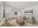 Comfortable living room featuring neutral furniture, a rug, and contemporary artwork at 2519 E Geneva Dr, Tempe, AZ 85282