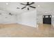 Large living room with tile floors and plenty of space to spread out at 2519 E Geneva Dr, Tempe, AZ 85282