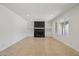Spacious living room with a brick fireplace and tile flooring at 2519 E Geneva Dr, Tempe, AZ 85282