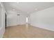 Bright and spacious living room featuring tile floors and access to other rooms at 2519 E Geneva Dr, Tempe, AZ 85282