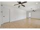 Spacious living room with tile flooring and ceiling fan at 2519 E Geneva Dr, Tempe, AZ 85282