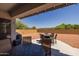 Charming covered patio with stylish outdoor furniture, ideal for relaxing and enjoying the backyard at 2750 W Pollack St, Phoenix, AZ 85041