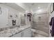 Contemporary bathroom with granite countertops, a walk-in shower, and modern fixtures at 2750 W Pollack St, Phoenix, AZ 85041