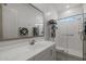 Modern bathroom with white vanity, frameless shower and glass door at 2750 W Pollack St, Phoenix, AZ 85041