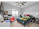 Bedroom with ceiling fan, neutral walls and carpet at 2750 W Pollack St, Phoenix, AZ 85041