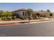 Beautiful home exterior with lush landscaping and a well-maintained lawn on a corner lot at 2750 W Pollack St, Phoenix, AZ 85041